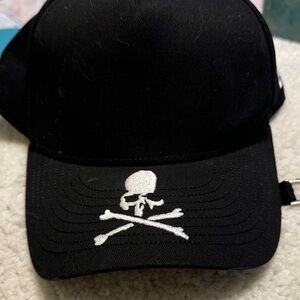 Practically new, never used. Era Black Hat with White Skull and Crossbones